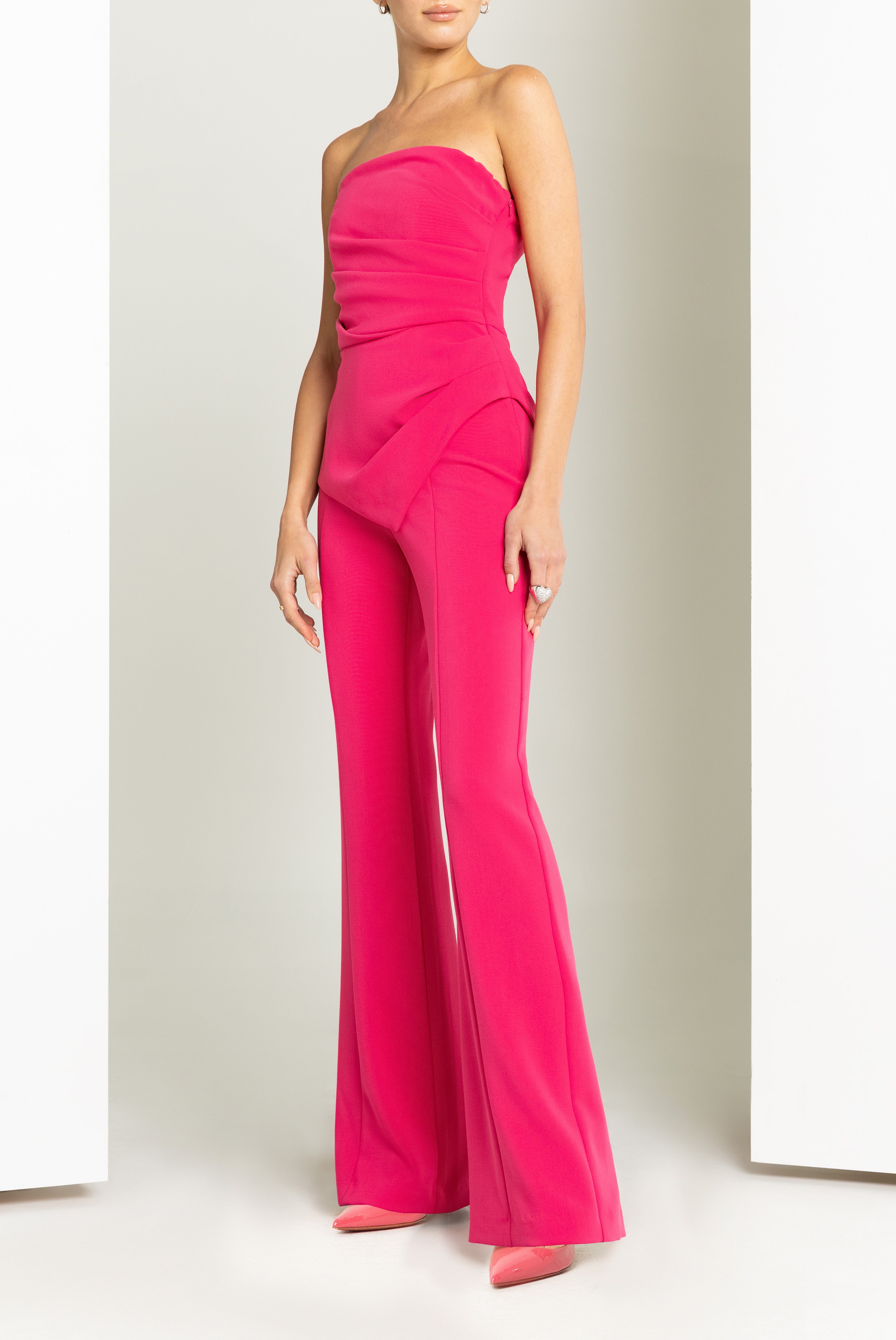Rockie High-Stretch Woven Jumpsuit — Sunburst Bodice & Asymmetrical Peplum Waist