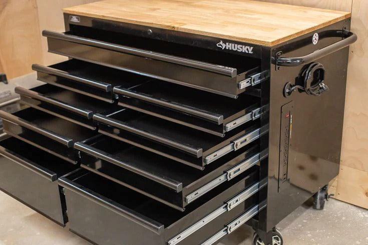 Mobile workbench with 9 drawers, hardwood top and power connection, 117 cm W x 62 cm D – high-gloss black