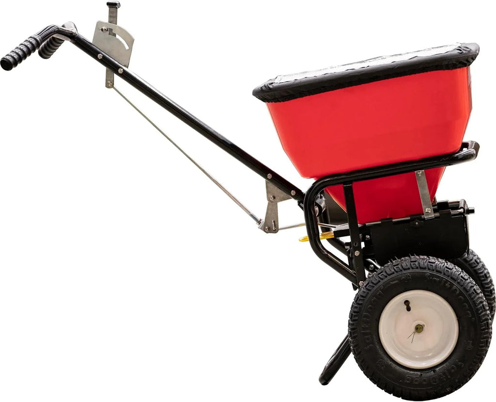 Multi-purpose push-along spreader, 100 lb capacity, versatile tool for lawn seed, salt, de-icer, fertilizer and seeds
